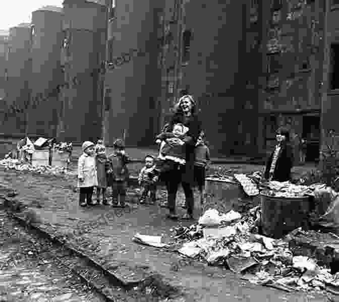 A Black And White Photograph Of A Glasgow Slum In The Early 1900s, Showing A Group Of Children Playing In The Street. Central Glasgow Through Time Etta Dunn