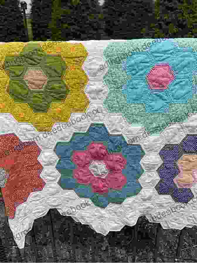 A Classic And Timeless Grandmother's Flower Garden Quilt, Featuring Intricate Appliqué And Hand Stitching. Fresh Family Traditions: 18 Heirloom Quilts For A New Generation