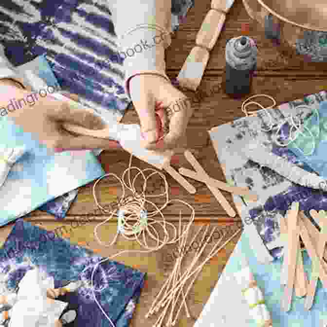 A Tie Dye Artisan Skillfully Applies Shibori Techniques To Create Intricate Patterns On A Piece Of Fabric. The Folded And Bound Fabric Creates Unique Resists That Result In Captivating And Elegant Designs. TIE AND DYE HANDBOOK: Keep The Shirt In Its Original Shape Will Creating New Designs