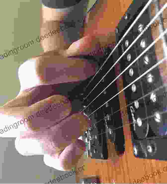 Guitarist Playing Harmonics On Guitar Country Guitar Soloing Techniques: Learn Hot Country Hybrid Picking Banjo Rolls Licks Techniques (Learn How To Play Country Guitar)