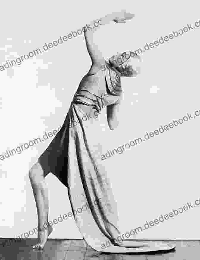 Mary Wigman Performing, Captured In A Dynamic And Expressive Pose, Her Body Twisted And Arms Outstretched, Embodying The Essence Of Expressionist Dance. Mary Wigman (Routledge Performance Practitioners)